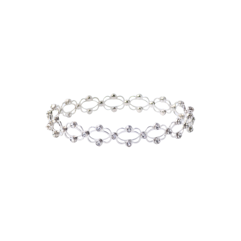 Silver bracelet with small beads on a white background