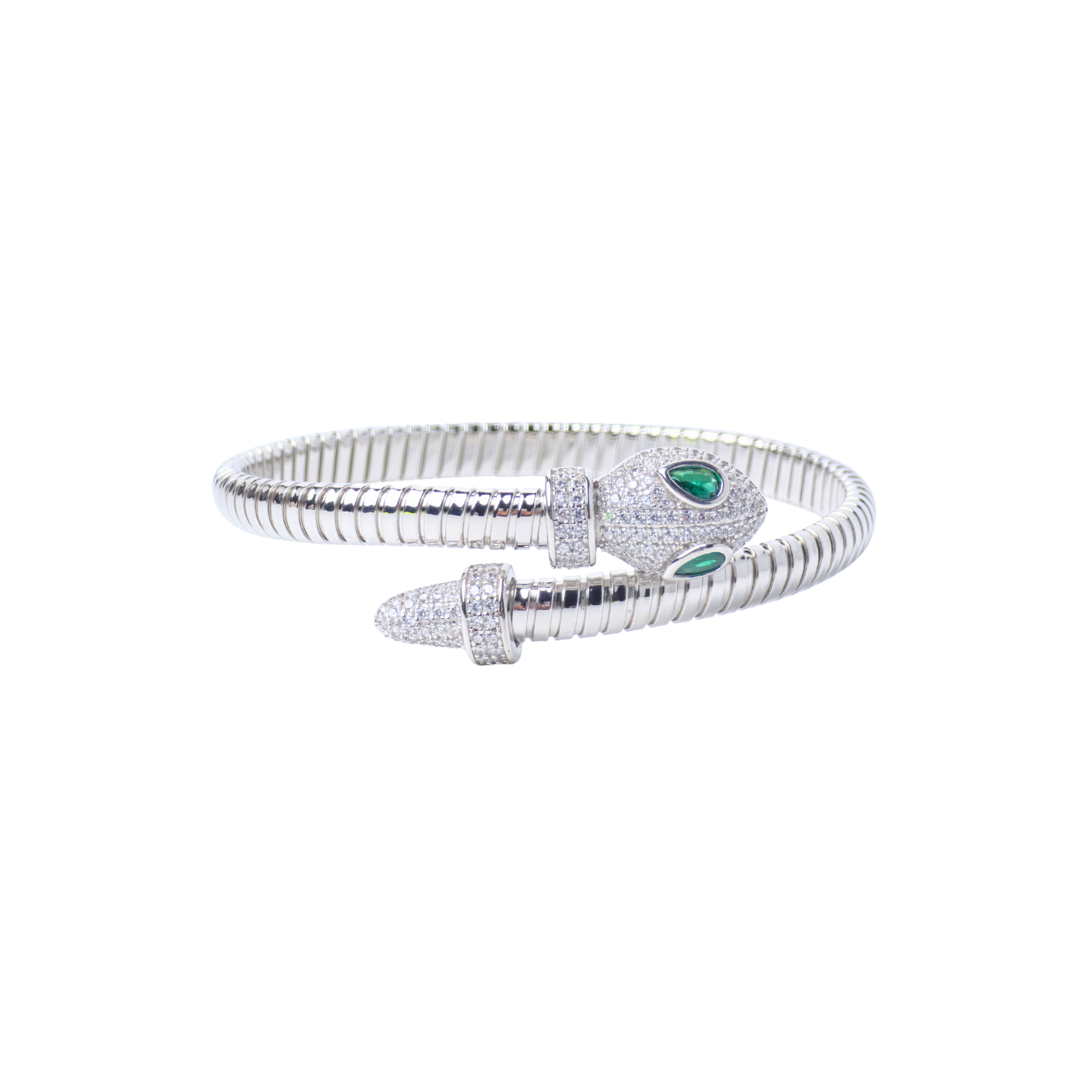 Silver bracelet with green gemstones on a white background