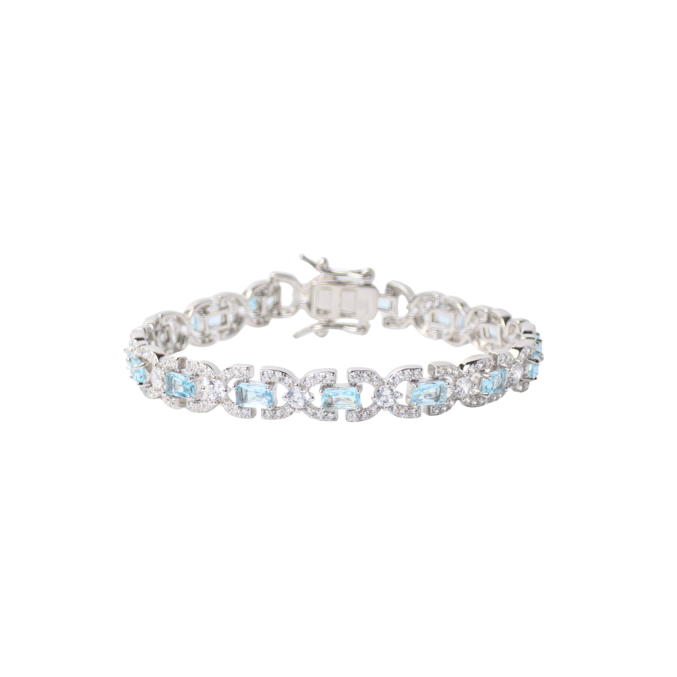 Silver bracelet with clear stones on a white background