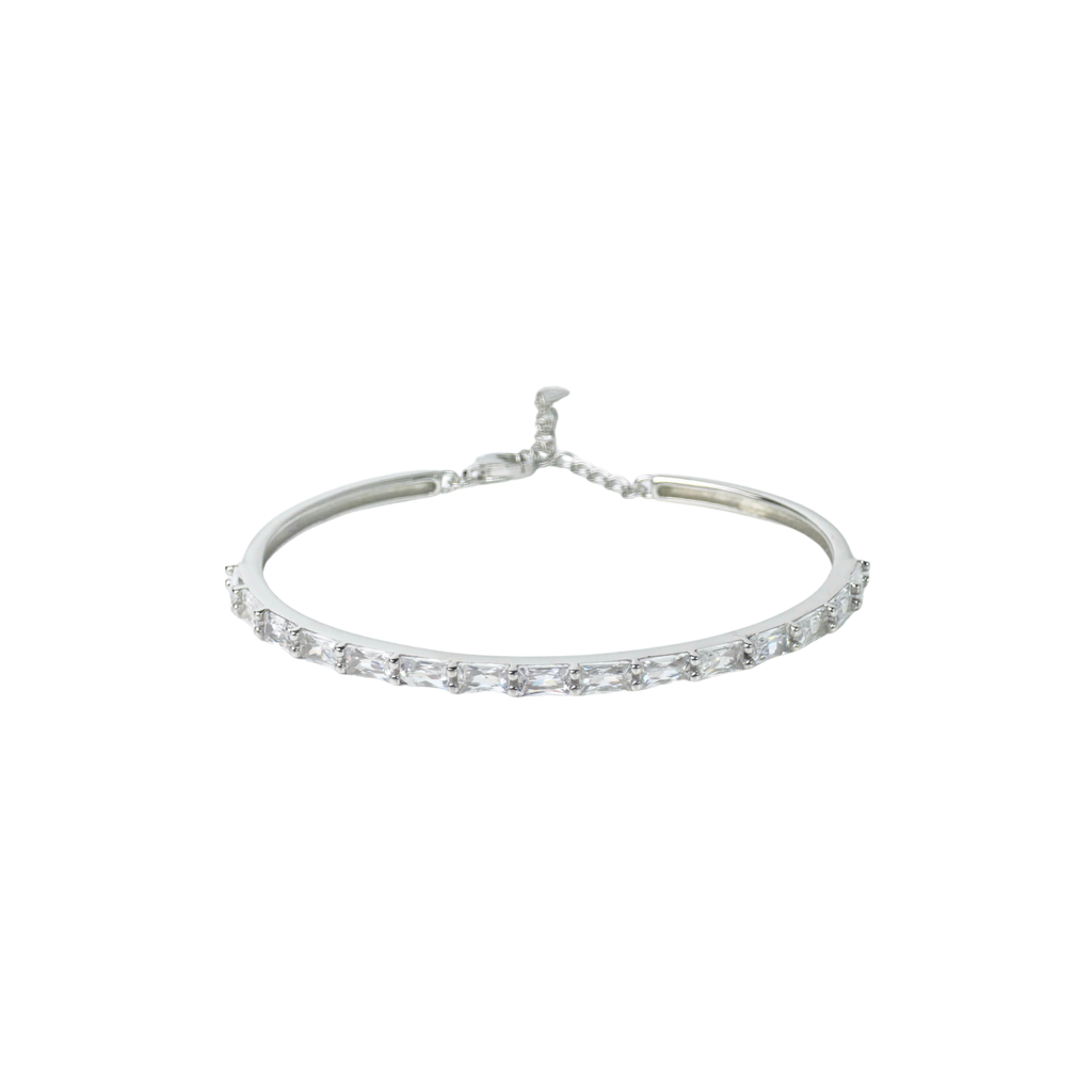Silver bracelet with clear stones on a white background