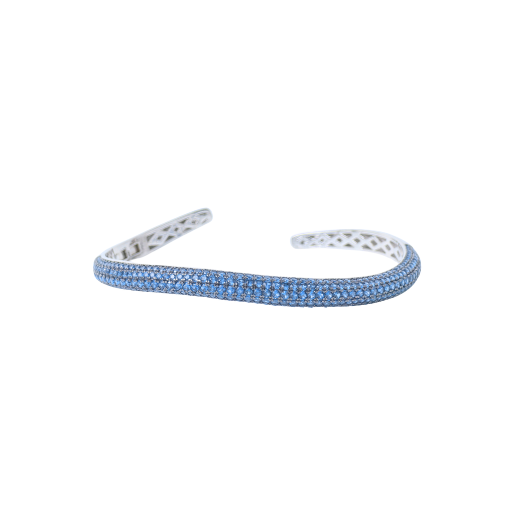 Silver bracelet with blue stones on a white background