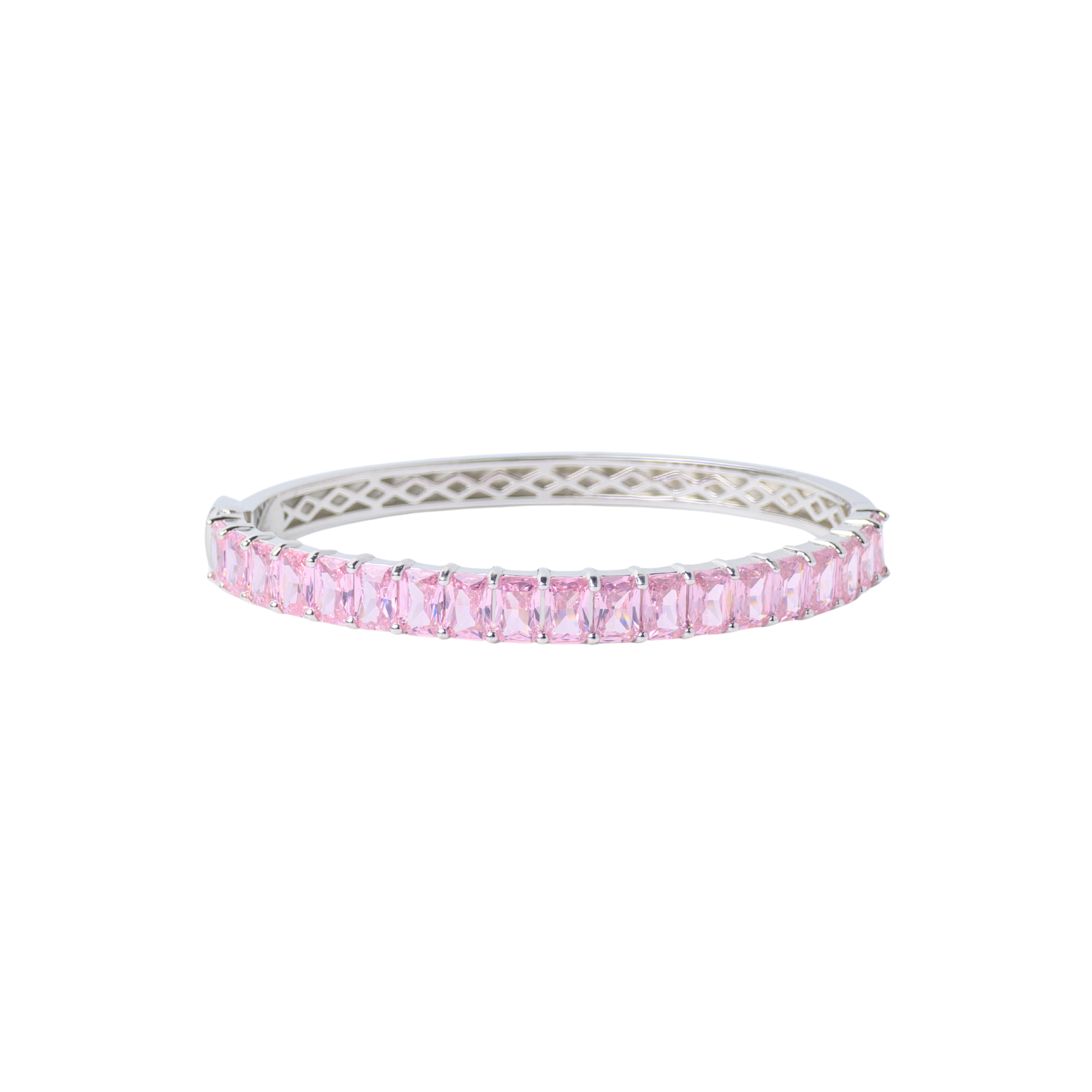 Silver ring with pink gemstones on a white background